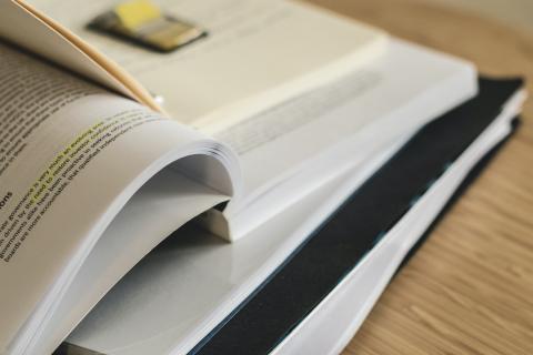 A book lays open on a table